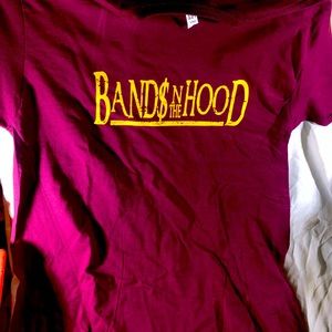 Custom shirts labeled “bands in the Hood”